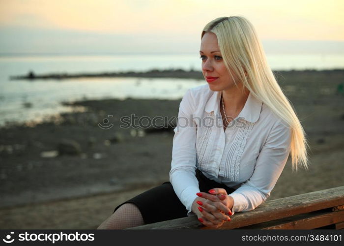 woman portrait lake on background