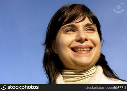 woman portrait with the sky as background