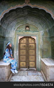 Woman posing at City Palace in Jaipur, Rajasthan, India