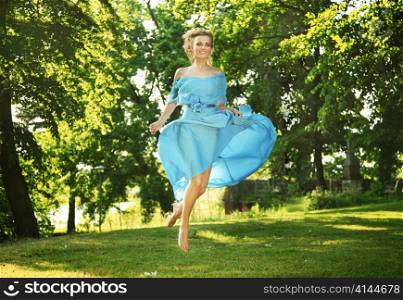 Woman posing in a park.