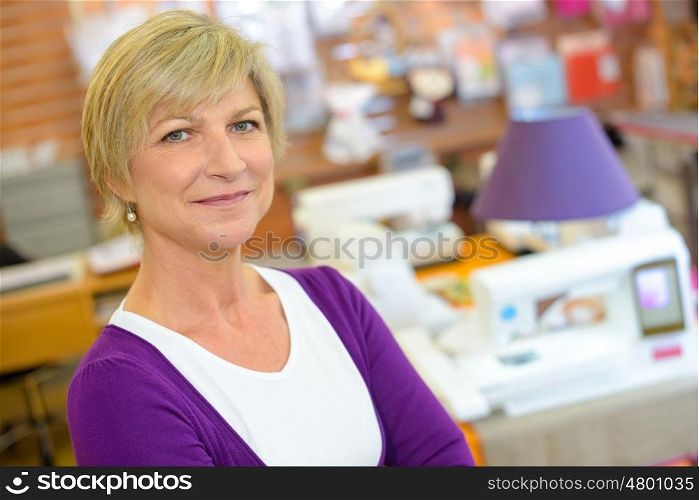 woman posing in a workshop