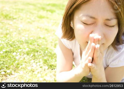 woman posing on grass