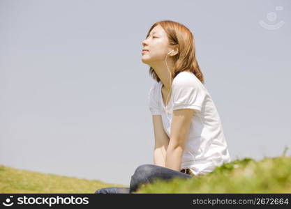 woman posing on grass