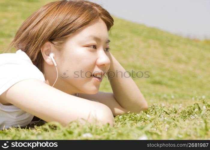 woman posing on grass