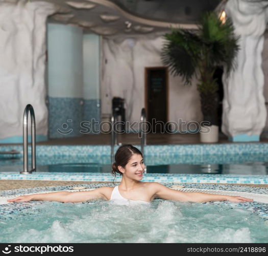 woman posing relaxed hot tub