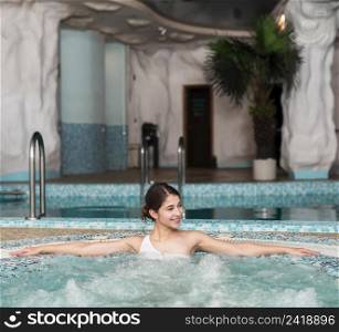 woman posing relaxed hot tub