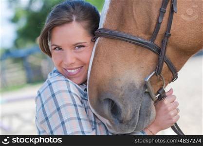 woman posing with a horse