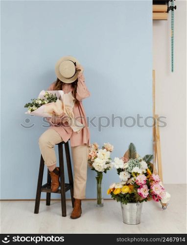 woman posing with bouquet spring flowers