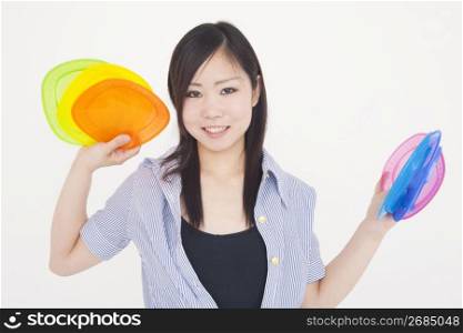 woman posing with coloured disks