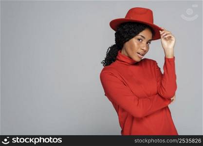 woman posing with hat copy space