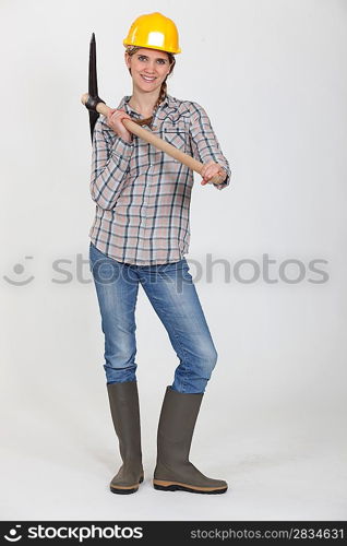 Woman posing with hatchet