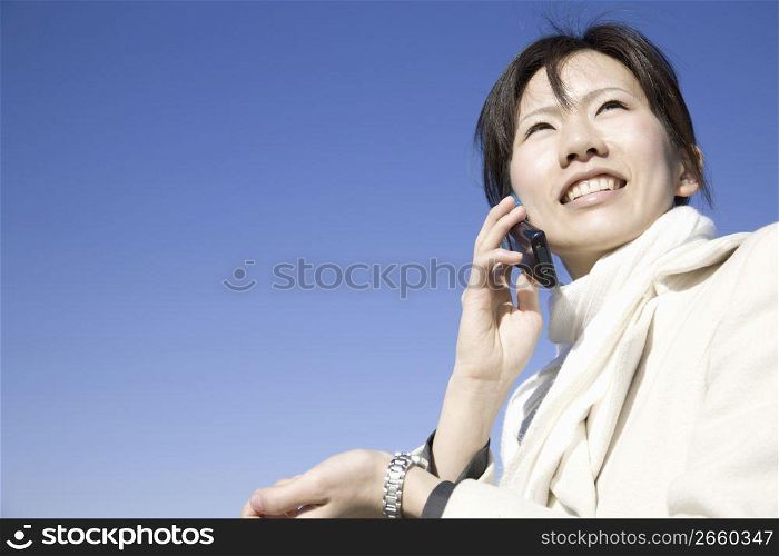 woman posing with phone