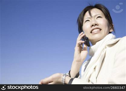 woman posing with phone