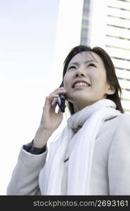 woman posing with phone