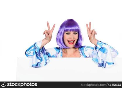 Woman posing with purple wig