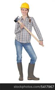 Woman posing with sledge hammer