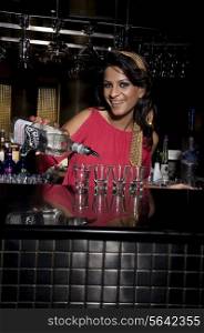 Woman pouring drinks