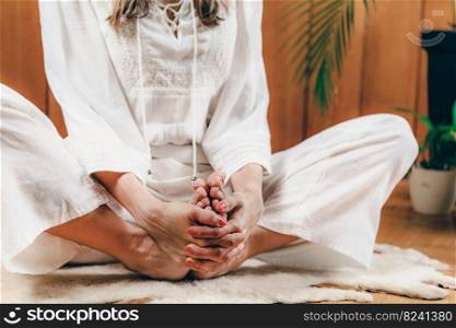 Woman practicing Kundalini Yoga for feminine energy . Kundalini Yoga for Feminine Energy. 