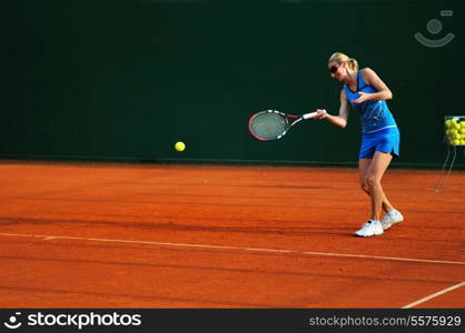 woman practicing tennis sport outdoor