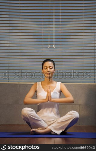 Woman practicing Yoga