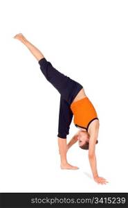 Woman practicing yoga exercise called: Standing Split, sanskrit name: Urdhva Prasarita Eka Padasana, this posture stretches and strengthens the hamstrings, calves, thighs, ankles, knees