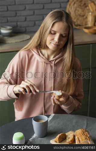 woman preparing breakfast medium shot
