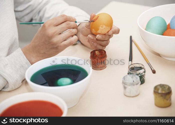 Woman preparing Easter eggs