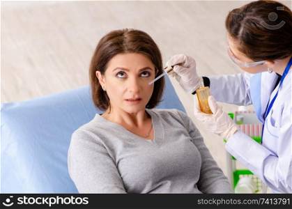 Woman preparing for cosmetic plastic surgery