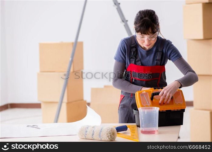 Woman preparing for wallpaper work
