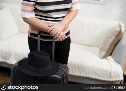 Woman preparing luggage  packing in suitcase  trolley luggage traveling alone solo girl