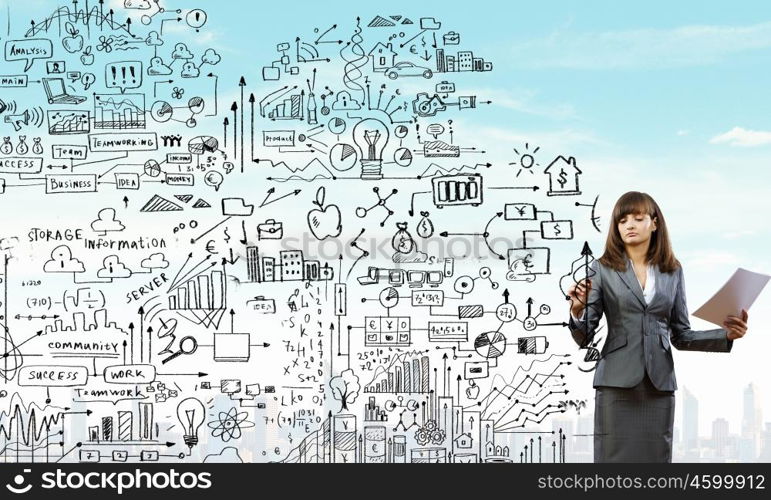 Woman presenting business plan. Young businesswoman drawing strategy plan on screen