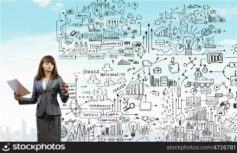 Woman presenting business plan. Young businesswoman drawing strategy plan on screen