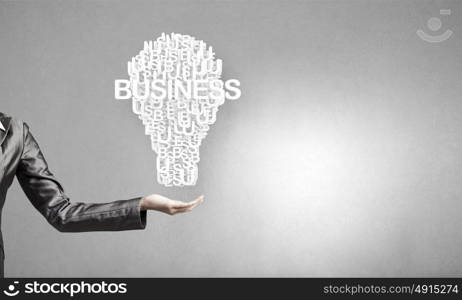 Woman presenting idea. Businesswoman holding in hand successful idea concept