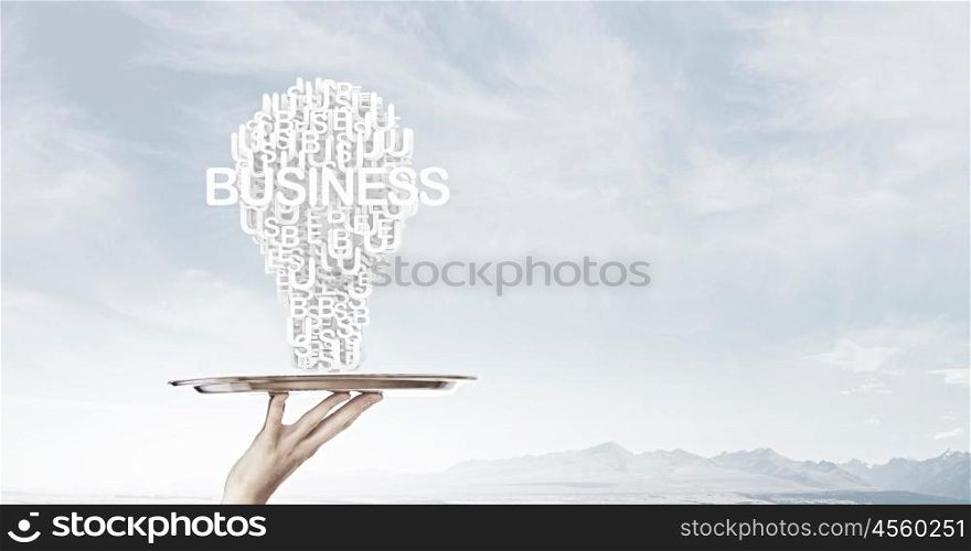 Woman presenting idea. Hand of woman holding tray with successful idea concept