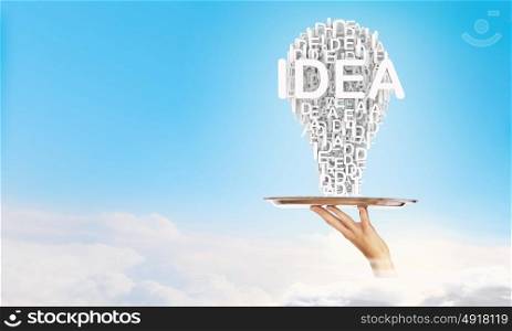 Woman presenting idea. Hand of woman holding tray with successful idea concept