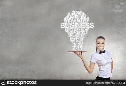 Woman presenting idea. Pretty woman holding tray with successful idea concept