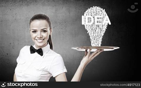 Woman presenting idea. Pretty woman holding tray with successful idea concept
