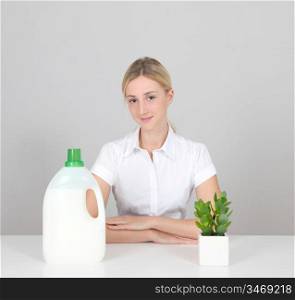 Woman presenting organic laundry detergent