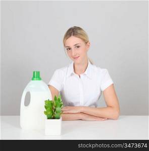Woman presenting organic laundry detergent