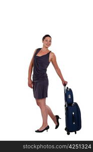 Woman pulling along luggage