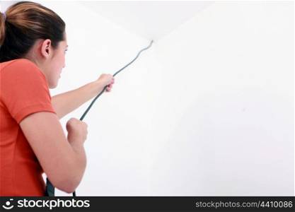 Woman pulling cable
