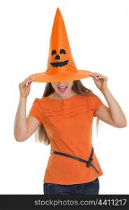 Woman pulling Halloween hat over eyes