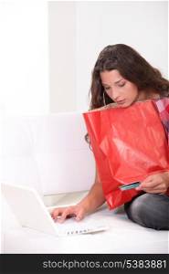 Woman purchasing products on-line