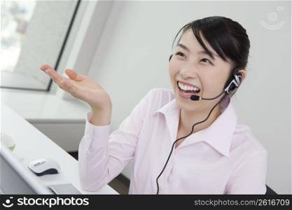 Woman putting on a headset