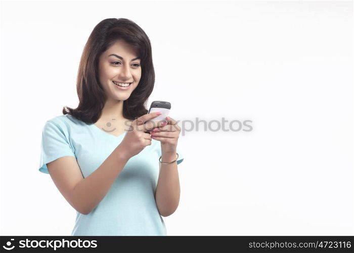 Woman reading an sms on a mobile phone