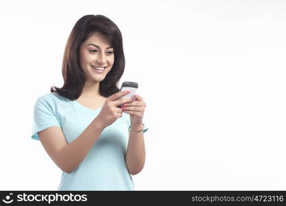 Woman reading an sms on a mobile phone