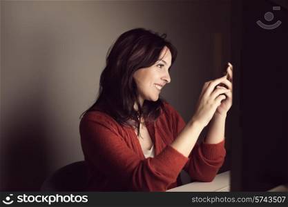 Woman reading and writting instant messages