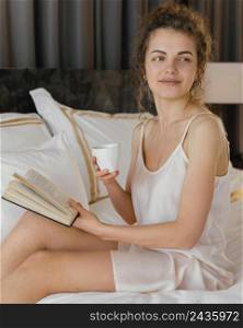woman reading drinking coffee 2