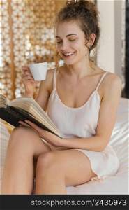 woman reading drinking coffee 3