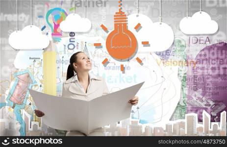 Woman reading newspaper. Portrait of young businesswoman in white suit reading blank newspaper